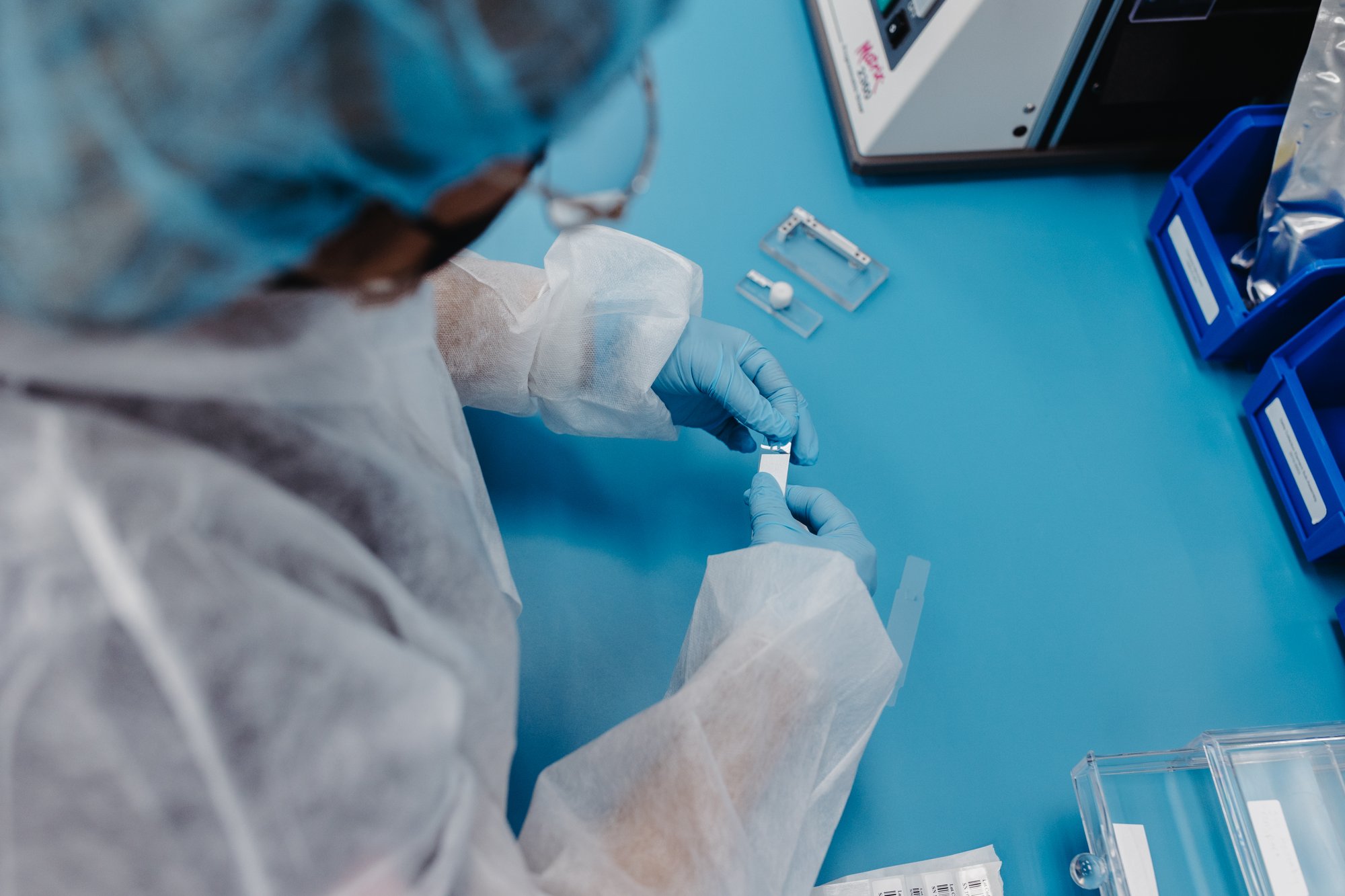 A Micron employee working in the cleanroom