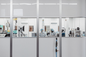 employees working in a cleanroom