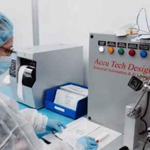 Micron Solutions team member working in a cleanroom