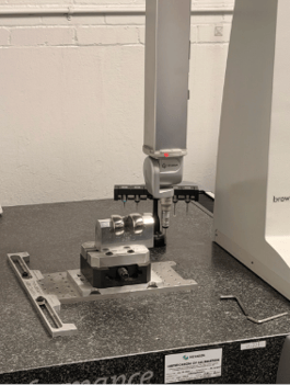 a knee implant on a machine